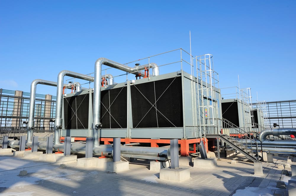 What is the difference between air-cooled and water-cooled chillers