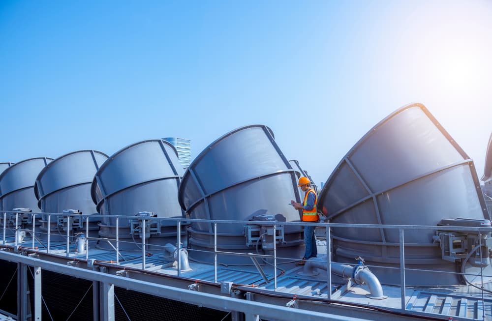 How can I optimize my cooling tower
