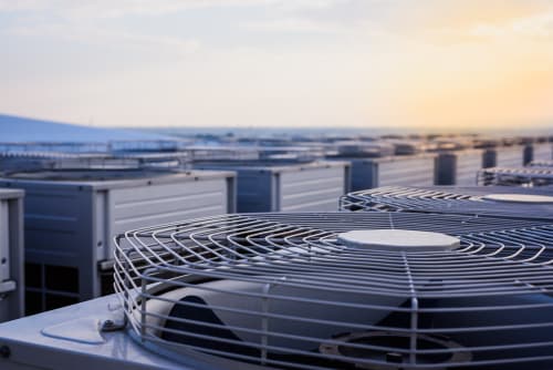 Why is on-site consultation important when renting portable AC