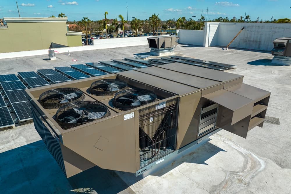 What affects the lifespan of industrial air conditioners