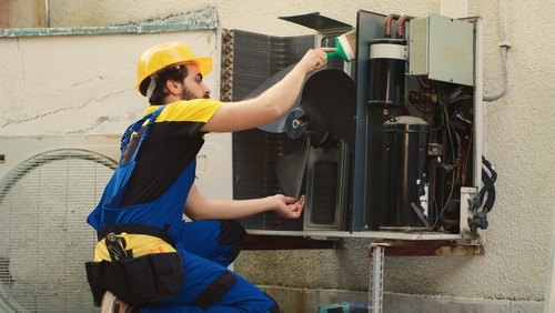 How often should an outdoor AC unit be serviced