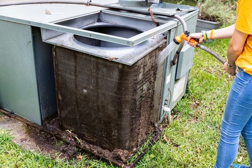 How often should an outdoor AC unit be serviced