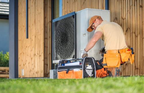How do I calculate the heating load for my home HVAC system