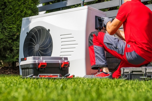 How does a heat pump work in a home heating system