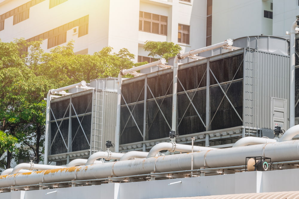 What is the function of a primary pump in a chiller